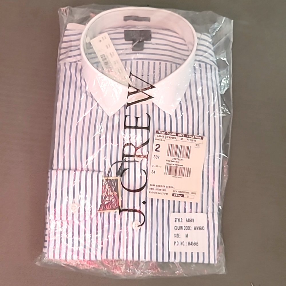 New white collared with a blue pin stripe shirt